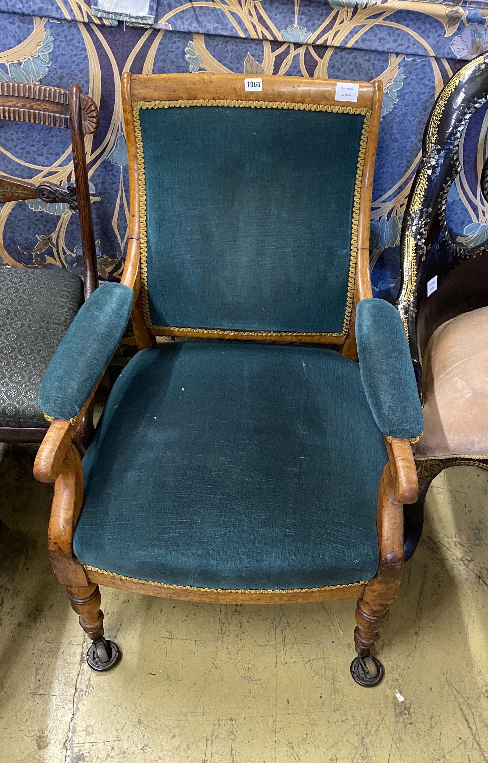A Victorian maple upholstered open armchair, width 62cm, depth 60cm, height 85cm
